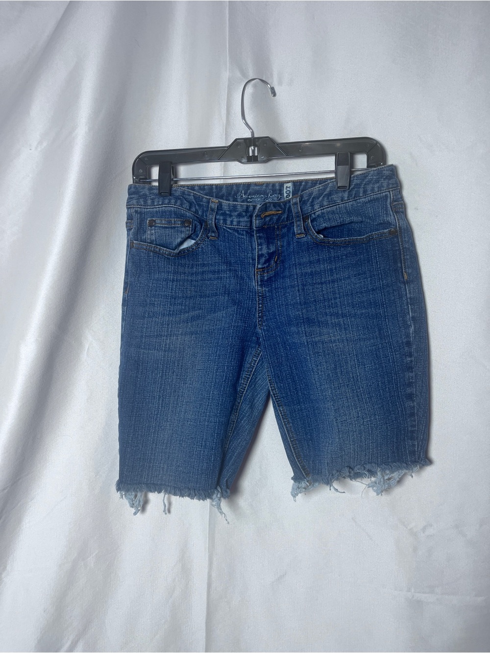 American Rag Light Blue Denim Shorts with Frayed Hem
